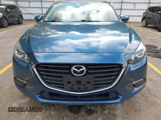 2018 Mazda 3 Touring z VIN 3MZBN1L38JM235604, wystawiony jako IAAI lot #42333995 z przebiegiem 69 541 mil mil oraz . Historia ofert i sprzedaży dostępna na DreamBid. Obrazek 12.