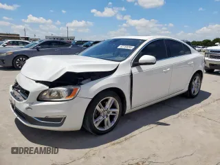 2015 Volvo S60 T5 Drive-E Premier with VIN YV140MFB3F2306585, listed as a Copart auction lot 62769295 with 112,259 mi miles and Salvage title. Bid and sale history available at DreamBid. Image 1.
