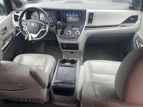 2015 Toyota Sienna XLE с VIN 5TDYK3DC6FS531521, выставлен на аукционе Copart как лот 62923695 с пробегом 135 782 миль миль и Списание • Salvage title. История ставок и продаж доступна на DreamBid. Изображение 8.