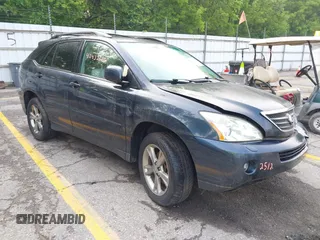 2006 Lexus RX 400h z VIN JTJHW31U060016922, wystawiony jako IAAI lot #42432512 z przebiegiem Nie podano mil oraz . Historia ofert i sprzedaży dostępna na DreamBid. Obrazek 1.