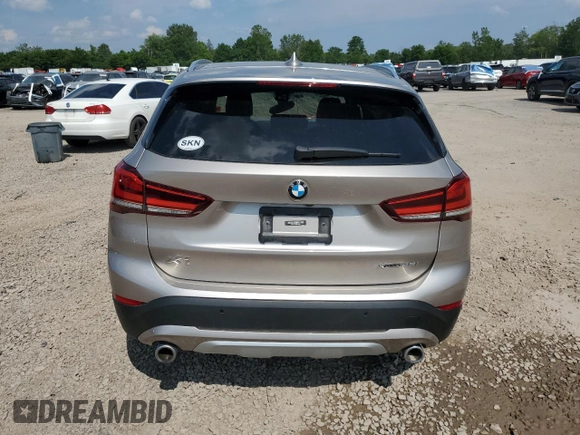 2021 BMW X1 xDrive28i with VIN WBXJG9C09M5S52289, listed as a Copart auction lot 64413105 with Not provided miles and Salvage title. Bid and sale history available at DreamBid. Image 6.