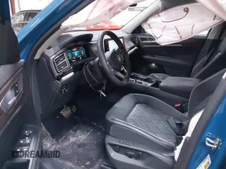 2025 Volkswagen Atlas SEL Premium R-Line z VIN 1V2FR2CA8SC521161, wystawiony jako IAAI lot #42191744 z przebiegiem 8 570 mil mil oraz . Historia ofert i sprzedaży dostępna na DreamBid. Obrazek 5.