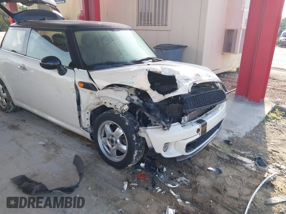2011 MINI Hardtop with VIN WMWSU3C5XBT095591, listed as a IAAI auction lot 42366393 with 99,092 mi miles and . Bid and sale history available at DreamBid. Image 6.