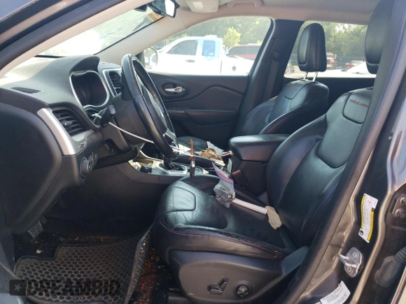 2014 Jeep Cherokee Trailhawk with VIN 1C4PJMBS1EW304718, listed as a Copart auction lot 64105485 with 151,315 mi miles and Salvage title. Bid and sale history available at DreamBid. Image 7.