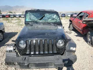 2023 Jeep Wrangler Sport Altitude with VIN 1C4HJXDN9PW634199, listed as a Copart auction lot 65940434 with Not Provided miles and Salvage Title. Bid and sale history available at DreamBid. Image 5.