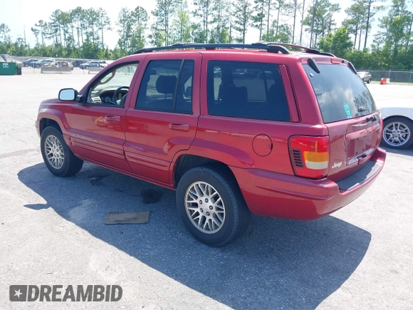 2004 Jeep Grand Cherokee Limited with VIN 1J4GX58N34C401838, listed as a IAAI auction lot 42714681 with 205,477 mi miles and . Bid and sale history available at DreamBid. Image 3.