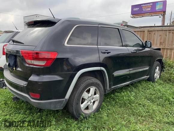 2012 Jeep Grand Cherokee Laredo with VIN 1C4RJEAG8CC119401, listed as a IAAI auction lot 41724335 with 233,265 mi miles. Bid and sale history available at carsss.com. Image 4.