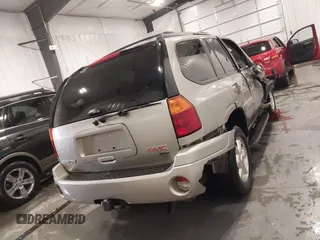 2003 GMC Envoy SLT with VIN 1GKDT13S932395367, listed as a IAAI auction lot 41544810 with 142,012 mi miles. Bid and sale history available at carsss.com. Image 15.