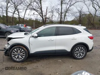 2020 Ford Escape Titanium Hybrid with VIN 1FMCU9DZ0LUC56274, listed as a IAAI auction lot 41256530 with 43,502 mi miles and . Bid and sale history available at DreamBid. Image 15.