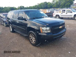 2007 Chevrolet Suburban LS with VIN 1GNFC16J97R335570, listed as a IAAI auction lot 42727238 with 360,308 mi miles and . Bid and sale history available at DreamBid. Image 1.
