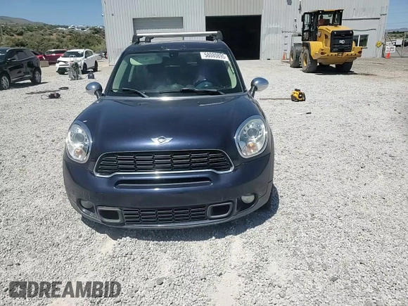 2013 MINI Countryman S ALL4 with VIN WMWZC5C50DWM15256, listed as a Copart auction lot 58080895 with 123,514 mi miles and Salvage title. Bid and sale history available at DreamBid. Image 13.