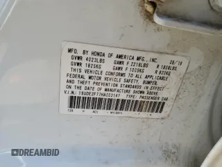 2017 Acura ILX Premium z VIN 19UDE2F77HA003147, wystawiony jako Copart lot #61502105 z przebiegiem Nie podano mil oraz Szkoda całkowita • Salvage title. Historia ofert i sprzedaży dostępna na DreamBid. Obrazek 13.