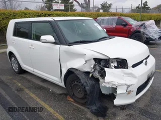 2015 Scion xB with VIN JTLZE4FE5FJ081202, listed as a IAAI auction lot 41803183 with 212,078 mi miles. Bid and sale history available at carsss.com. Image 1.