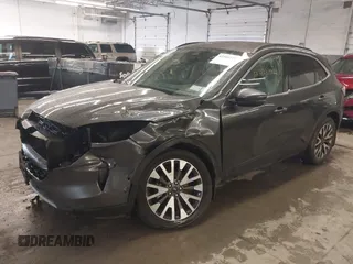 2020 Ford Escape Titanium with VIN 1FMCU9J95LUA39338, listed as a IAAI auction lot 42319122 with 34,631 mi miles and . Bid and sale history available at DreamBid. Image 2.