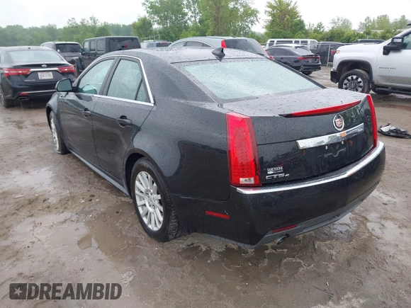 2013 Cadillac CTS Luxury z VIN 1G6DG5E50D0121280, wystawiony jako IAAI lot #42439031 z przebiegiem 75 211 mil mil oraz . Historia ofert i sprzedaży dostępna na DreamBid. Obrazek 3.