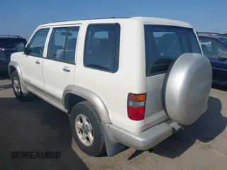 1999 Isuzu Trooper S with VIN JACDJ58X7X7926697, listed as a IAAI auction lot 42654076 with 62,672 mi miles and . Bid and sale history available at DreamBid. Image 3.