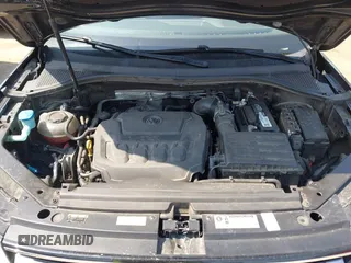 2018 Volkswagen Tiguan S with VIN 3VV1B7AX7JM092033, listed as a IAAI auction lot 42373619 with 124,775 mi miles and . Bid and sale history available at DreamBid. Image 10.