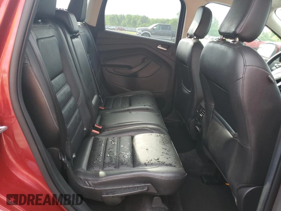 2019 Ford Escape Titanium with VIN 1FMCU0J98KUC00873, listed as a Copart auction lot 61674305 with 53,554 mi miles and Salvage title. Bid and sale history available at DreamBid. Image 11.