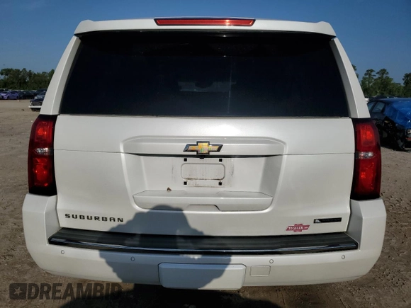 2017 Chevrolet Suburban Premier with VIN 1GNSCJKCXHR348044, listed as a Copart auction lot 55957535 with 112,131 mi miles and Salvage title. Bid and sale history available at DreamBid. Image 6.