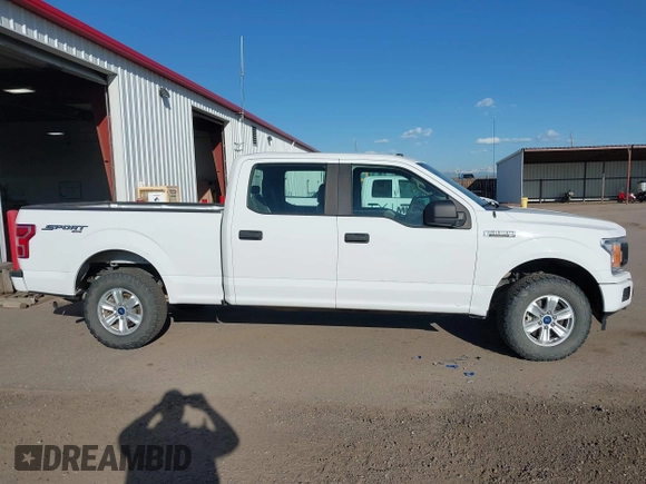 2018 Ford F-150 XL with VIN 1FTFW1E5XJFE79125, listed as a IAAI auction lot 42043296 with 165,003 mi miles. Bid and sale history available at carsss.com. Image 13.