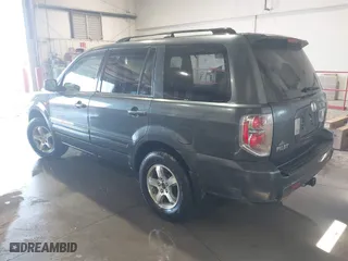 2006 Honda Pilot EX-L with RES with VIN 5FNYF28666B015764, listed as a IAAI auction lot 41703704 with 211,289 mi miles. Bid and sale history available at carsss.com. Image 3.