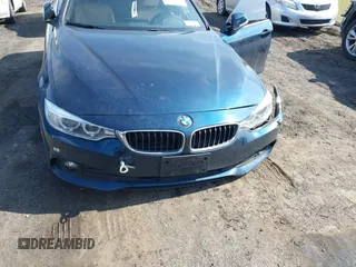 2016 BMW 4 Series 428i xDrive with VIN WBA4C9C56GG141089, listed as a IAAI auction lot 41587479 with 85,462 mi miles and . Bid and sale history available at DreamBid. Image 17.