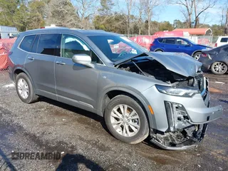 2023 Cadillac XT6 FWD Luxury z VIN 1GYKPAR42PZ220336, wystawiony jako IAAI lot #41281884 z przebiegiem 24 215 mil mil oraz . Historia ofert i sprzedaży dostępna na DreamBid. Obrazek 1.
