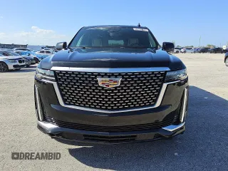 2023 Cadillac Escalade 4WD Premium Luxury z VIN 1GYS4BKL5PR365290, wystawiony jako Copart lot #56997165 z przebiegiem 46 466 mil mil oraz Tytuł czysty. Historia ofert i sprzedaży dostępna na DreamBid. Obrazek 5.