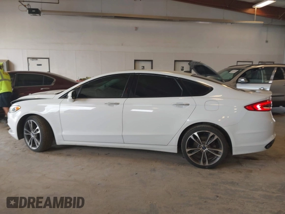 2017 Ford Fusion Titanium with VIN 3FA6P0D9XHR136815, listed as a IAAI auction lot 42596651 with 109,608 mi miles and . Bid and sale history available at DreamBid. Image 14.