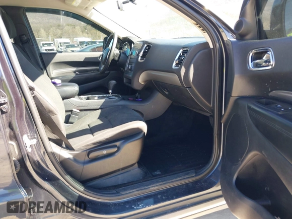 2013 Dodge Durango SXT with VIN 1C4RDJAG2DC530407, listed as a IAAI auction lot 41837441 with 133,375 mi miles and . Bid and sale history available at DreamBid. Image 5.