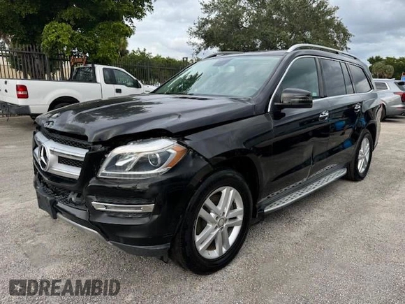 2016 Mercedes-Benz GL with VIN 4JGDF6EE1GA625384, listed as a Copart auction lot 77045634 with 104,938 mi miles and Salvage Title. Bid and sale history available at carsss.com. Image 1.
