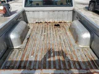 1998 Nissan Frontier XE z VIN 1N6DD21S8WC342950, wystawiony jako Copart lot #42089915 z przebiegiem Nie podano mil oraz Szkoda całkowita • Salvage title. Historia ofert i sprzedaży dostępna na DreamBid. Obrazek 11.