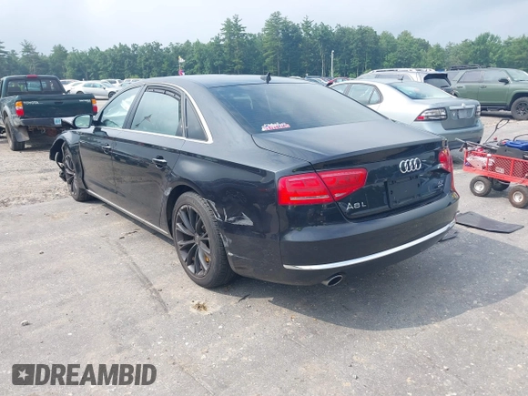 2012 Audi A8 with VIN WAURVAFDXCN017546, listed as a IAAI auction lot 39830968 with 123,089 mi miles and . Bid and sale history available at DreamBid. Image 3.