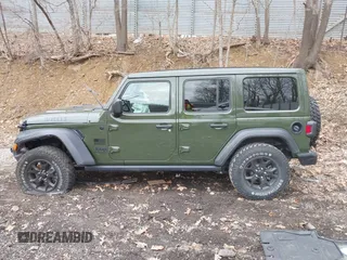 2021 Jeep Wrangler Unlimited Willys with VIN 1C4HJXDNXMW579595, listed as a IAAI auction lot 41930989 with 32,148 mi miles and . Bid and sale history available at DreamBid. Image 15.