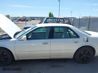 2003 Cadillac Seville Touring STS with VIN 1G6KY54963U110607, listed as a IAAI auction lot 42080691 with 79,605 mi miles. Bid and sale history available at carsss.com. Image 6.