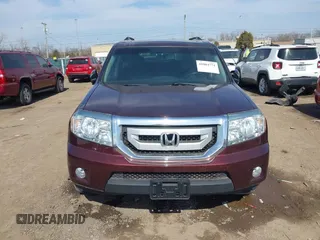 2009 Honda Pilot EX-L with VIN 5FNYF48639B020937, listed as a IAAI auction lot 41804771 with 226,668 mi miles and . Bid and sale history available at carsss.com. Image 12.