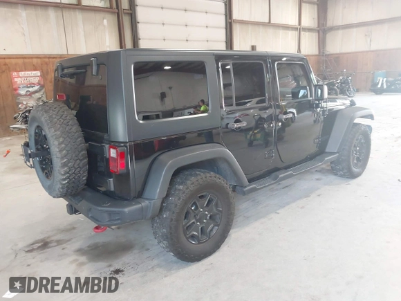 2017 Jeep Wrangler Unlimited Sport with VIN 1C4HJWDG2HL557576, listed as a IAAI auction lot 42712859 with 86,280 mi miles and . Bid and sale history available at DreamBid. Image 4.