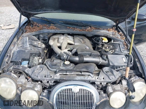 2005 Jaguar S-Type with VIN SAJWA01T15FN16454, listed as a IAAI auction lot 41650066 with 104,942 mi miles and . Bid and sale history available at DreamBid. Image 10.