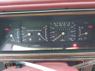 1992 Dodge Dynasty LE z VIN 1B3XC56R0ND750136, wystawiony jako IAAI lot #41955511 z przebiegiem 144 248 mil mil oraz . Historia ofert i sprzedaży dostępna na DreamBid. Obrazek 7.