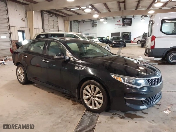 2018 Kia Optima EX with VIN 5XXGU4L30JG182878, listed as a IAAI auction lot 41733244 with 134,642 mi miles. Bid and sale history available at carsss.com. Image 1.