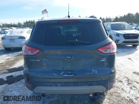 2016 Ford Escape SE with VIN 1FMCU9GX1GUC32307, listed as a IAAI auction lot 41395399 with 142,664 mi miles. Bid and sale history available at carsss.com. Image 16.