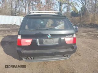 2003 BMW X5 4.4i with VIN 5UXFB33543LH43200, listed as a IAAI auction lot 41652303 with 169,250 mi miles. Bid and sale history available at carsss.com. Image 16.