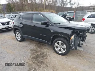 2019 Jeep Compass Latitude with VIN 3C4NJDBB1KT754314, listed as a IAAI auction lot 41869595 with 65,162 mi miles. Bid and sale history available at carsss.com. Image 1.