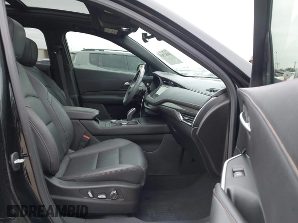2021 Cadillac XT4 FWD Sport with VIN 1GYFZER40MF039140, listed as a IAAI auction lot 41287513 with 51,725 mi miles and . Bid and sale history available at DreamBid. Image 5.