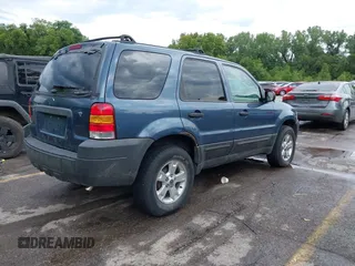 2005 Ford Escape XLT with VIN 1FMYU03165KD74390, listed as a IAAI auction lot 42799963 with 262,762 mi miles and . Bid and sale history available at DreamBid. Image 4.
