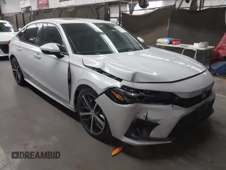 2022 Honda Civic Touring z VIN 2HGFE1F96NH302825, wystawiony jako IAAI lot #42075468 z przebiegiem 30 660 mil mil oraz . Historia ofert i sprzedaży dostępna na DreamBid. Obrazek 1.