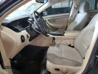 2013 Ford Taurus SEL with VIN 1FAHP2H88DG172316, listed as a Copart auction lot 54872575 with 154,926 mi miles and Salvage Title. Bid and sale history available at DreamBid. Image 7.