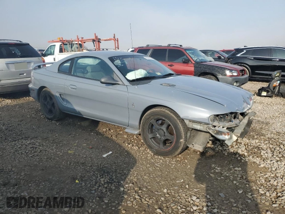 1994 Ford Mustang with VIN 1FALP4046RF182709, listed as a Copart auction lot 83690394 with 236,274 mi miles and Salvage Title. Bid and sale history available at carsss.com. Image 4.