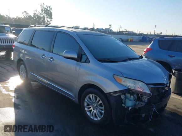 2012 Toyota Sienna XLE AAS with VIN 5TDYK3DC0CS243912, listed as a IAAI auction lot 41758833 with 132,008 mi miles and . Bid and sale history available at DreamBid. Image 1.