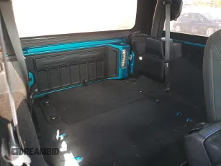 2020 Jeep Wrangler Willys z VIN 1C4GJXAG7LW260669, wystawiony jako Copart lot #57472685 z przebiegiem 21 075 mil mil oraz Szkoda całkowita • Salvage title. Historia ofert i sprzedaży dostępna na DreamBid. Obrazek 10.